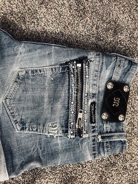 Blue Distressed Jeans with Embellished & Zippered Pocket and Logo Plate